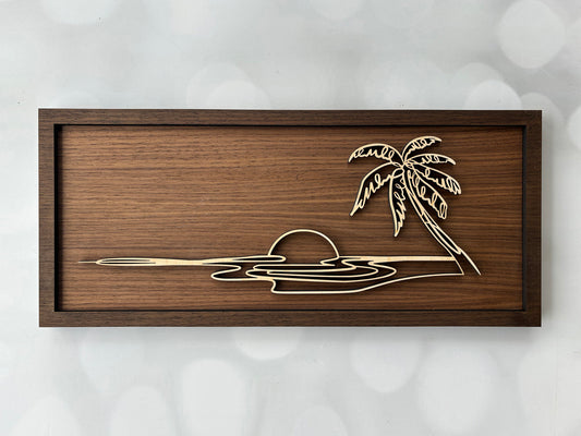 Wooden wall art with a palm tree design on a textured white background